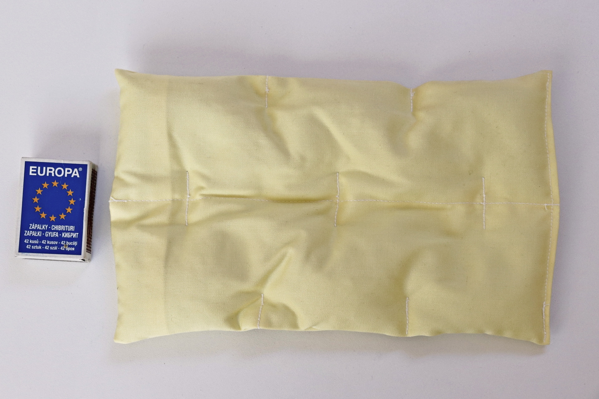 Minerální ohřevný polštářek k regeneraci svalů